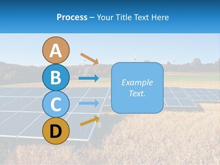 A Group Of Solar Panels In A Field PowerPoint Template