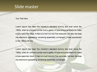 A Cup Of Green Tea With A Leaf On A Saucer PowerPoint Template