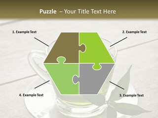 A Cup Of Green Tea With A Leaf On A Saucer PowerPoint Template