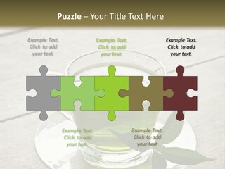 A Cup Of Green Tea With A Leaf On A Saucer PowerPoint Template