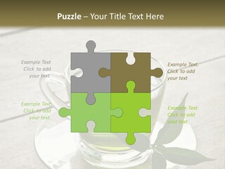 A Cup Of Green Tea With A Leaf On A Saucer PowerPoint Template