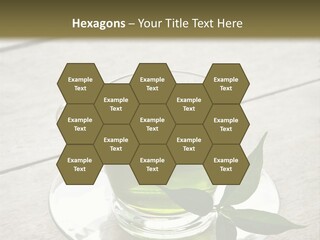 A Cup Of Green Tea With A Leaf On A Saucer PowerPoint Template