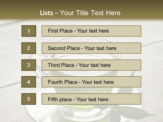 A Cup Of Green Tea With A Leaf On A Saucer PowerPoint Template