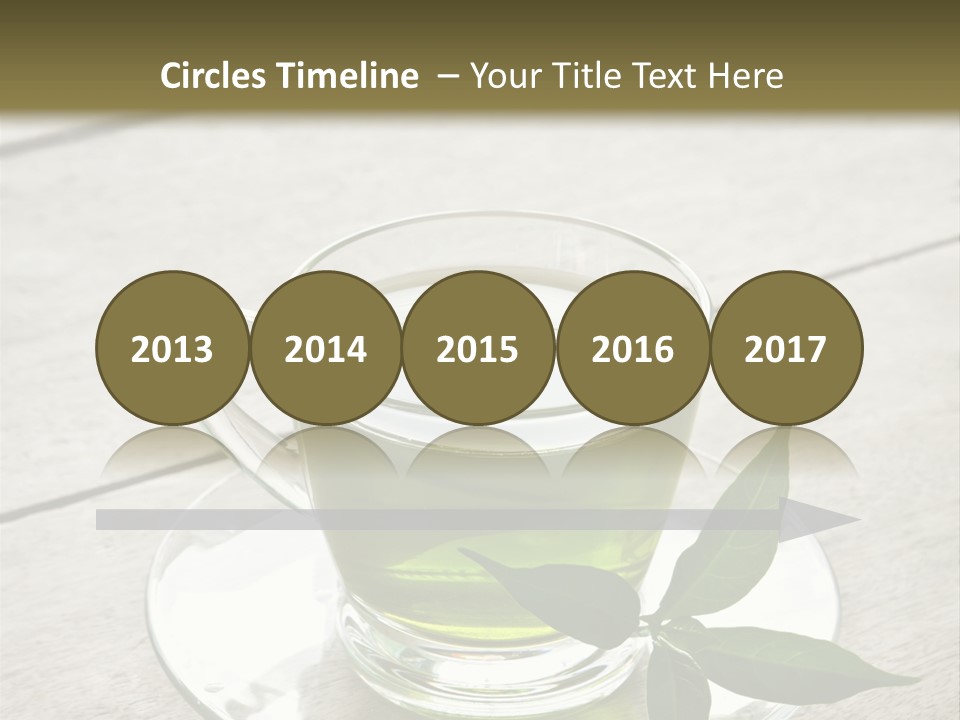 A Cup Of Green Tea With A Leaf On A Saucer PowerPoint Template