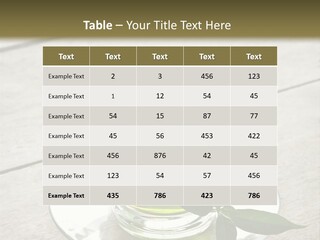 A Cup Of Green Tea With A Leaf On A Saucer PowerPoint Template