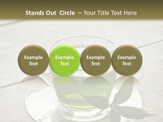 A Cup Of Green Tea With A Leaf On A Saucer PowerPoint Template