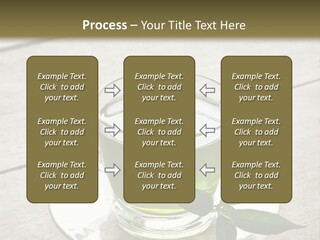 A Cup Of Green Tea With A Leaf On A Saucer PowerPoint Template