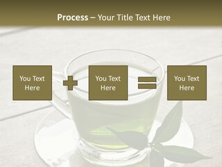 A Cup Of Green Tea With A Leaf On A Saucer PowerPoint Template
