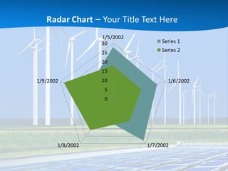 A Solar Power Plant With Windmills In The Background PowerPoint Template