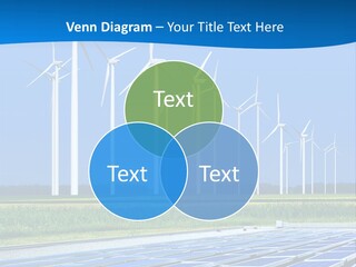 A Solar Power Plant With Windmills In The Background PowerPoint Template