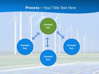 A Solar Power Plant With Windmills In The Background PowerPoint Template