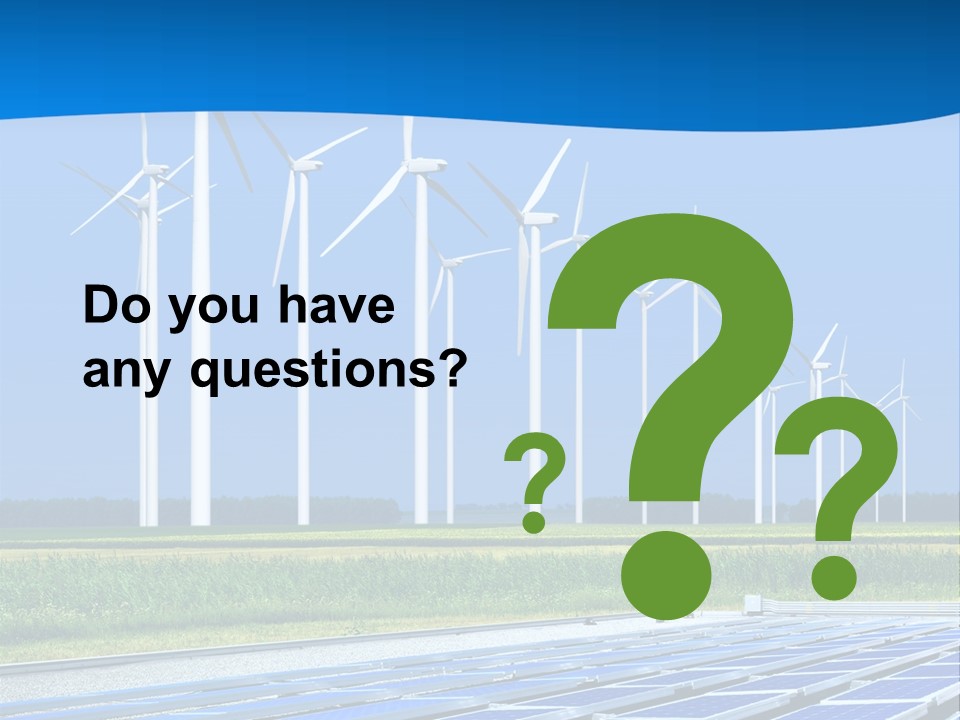 A Solar Power Plant With Windmills In The Background PowerPoint Template