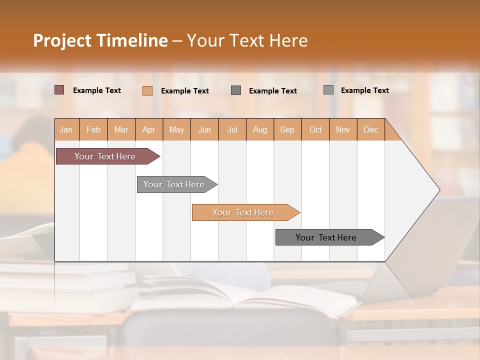 A Woman Sitting At A Desk With A Laptop Computer PowerPoint Template