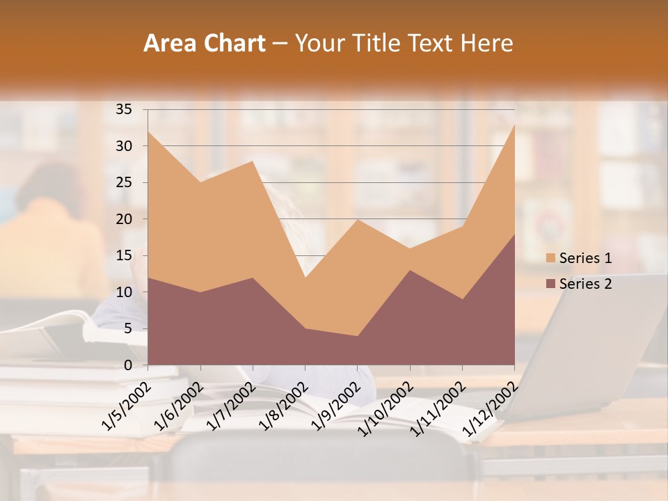 A Woman Sitting At A Desk With A Laptop Computer PowerPoint Template