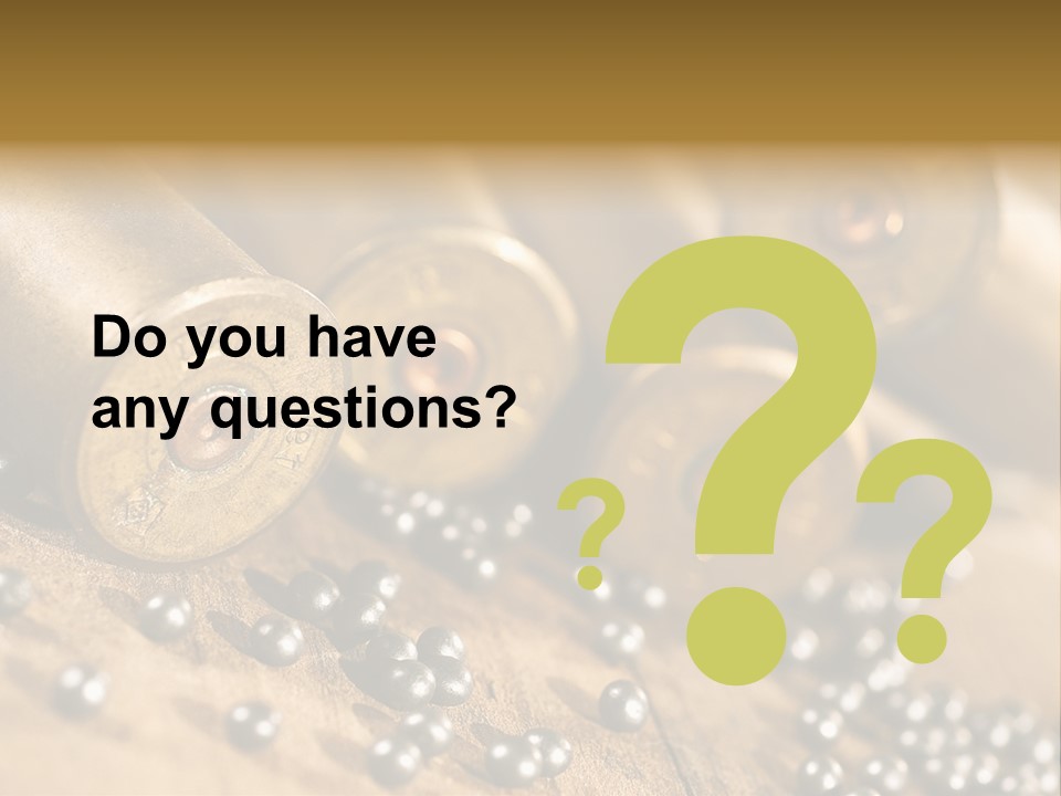 A Bunch Of Bullet Shells On A Wooden Table PowerPoint Template