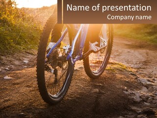 A Bike Is Parked On A Dirt Path PowerPoint Template