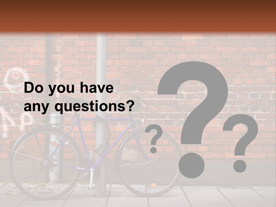 A Purple Bike Parked Next To A Brick Wall PowerPoint Template