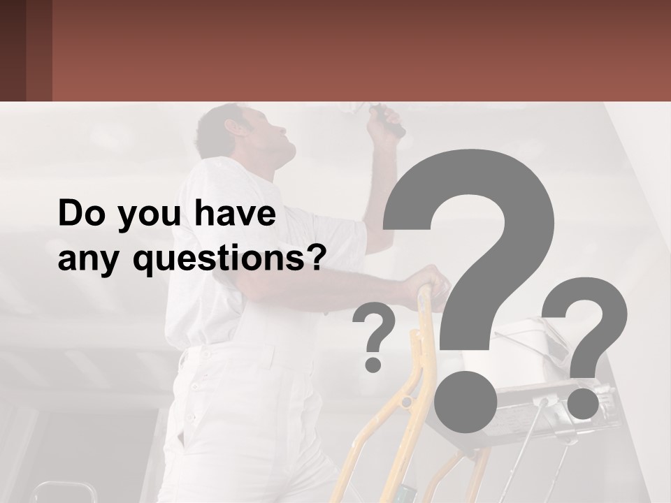 A Man Painting A Ceiling With A Paint Roller PowerPoint Template