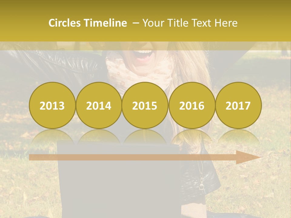 A Woman Sitting In The Grass With Her Laptop PowerPoint Template