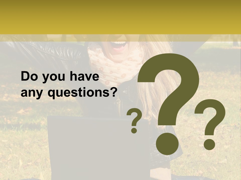 A Woman Sitting In The Grass With Her Laptop PowerPoint Template