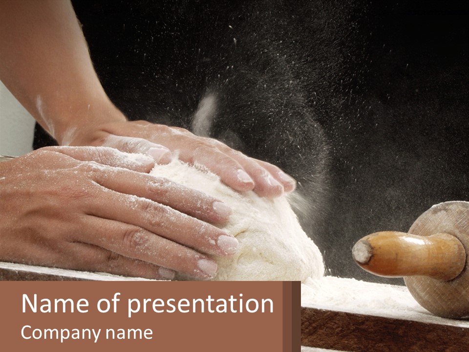 A Person Kneading Dough On Top Of A Table PowerPoint Template