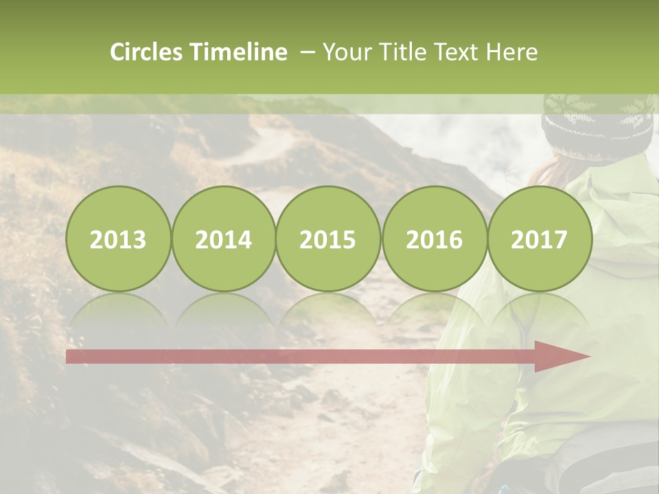 A Person Walking Up A Mountain Trail With Skis PowerPoint Template