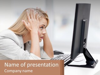 A Woman Sitting In Front Of A Computer With Her Hands On Her Head PowerPoint Template