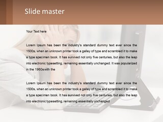 A Woman Sitting In Front Of A Computer With Her Hands On Her Head PowerPoint Template