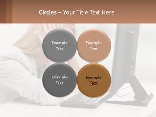 A Woman Sitting In Front Of A Computer With Her Hands On Her Head PowerPoint Template