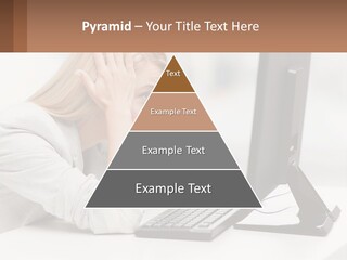 A Woman Sitting In Front Of A Computer With Her Hands On Her Head PowerPoint Template