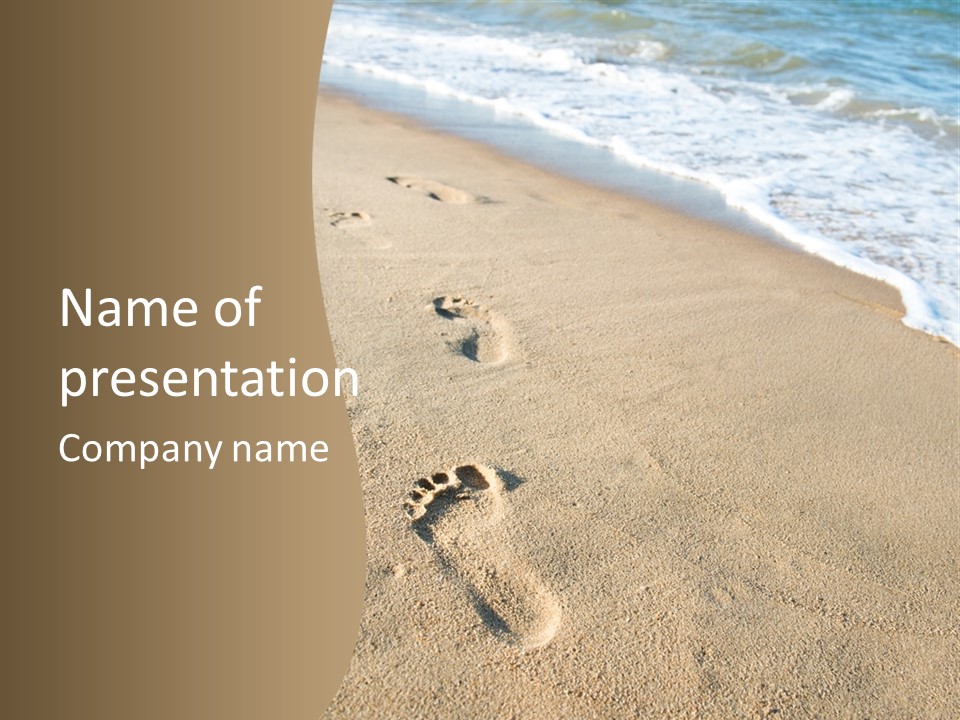 Footprints In The Sand On A Beach With The Ocean In The Background PowerPoint Template