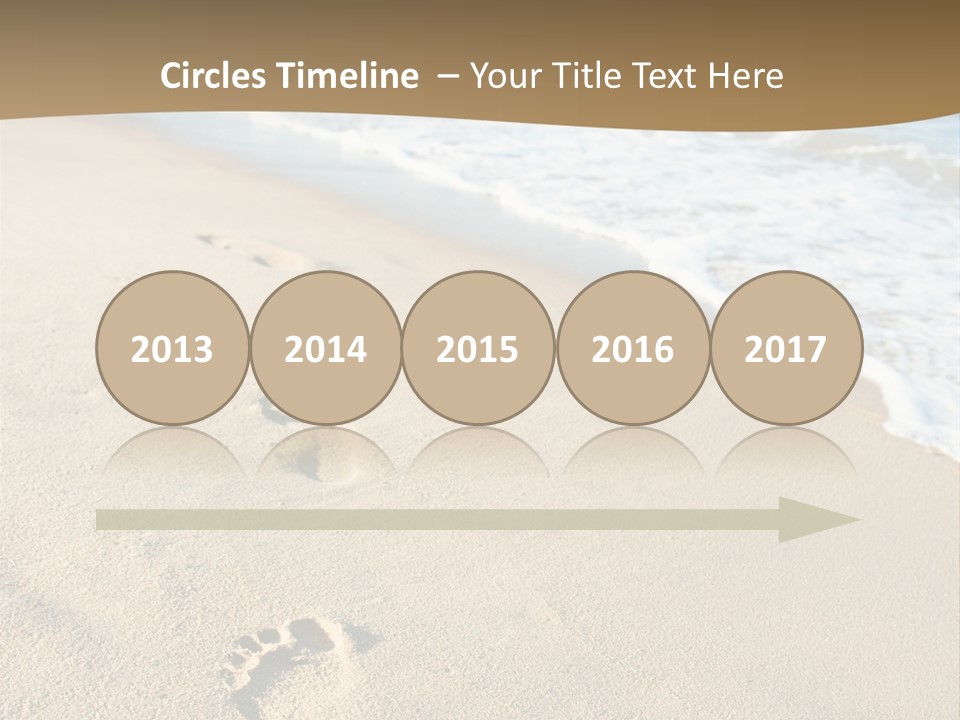 Footprints In The Sand On A Beach With The Ocean In The Background PowerPoint Template