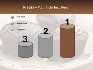 Three Chocolate Muffins On A Plate With Chocolate Drizzled On Them PowerPoint Template