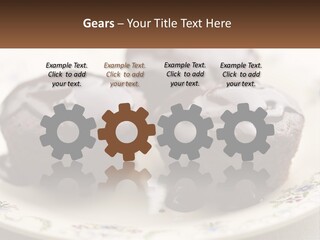 Three Chocolate Muffins On A Plate With Chocolate Drizzled On Them PowerPoint Template