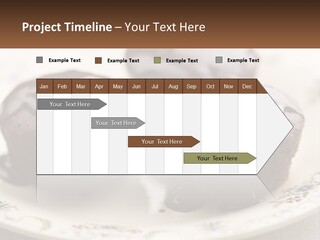 Three Chocolate Muffins On A Plate With Chocolate Drizzled On Them PowerPoint Template
