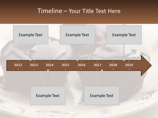 Three Chocolate Muffins On A Plate With Chocolate Drizzled On Them PowerPoint Template