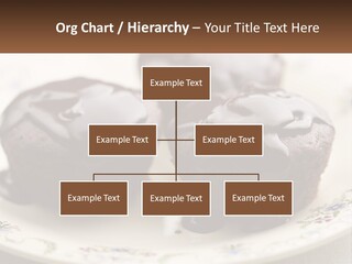 Three Chocolate Muffins On A Plate With Chocolate Drizzled On Them PowerPoint Template