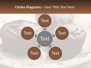 Three Chocolate Muffins On A Plate With Chocolate Drizzled On Them PowerPoint Template