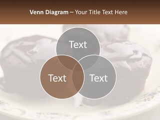 Three Chocolate Muffins On A Plate With Chocolate Drizzled On Them PowerPoint Template