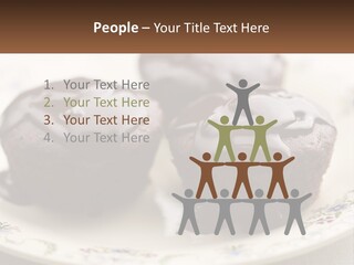 Three Chocolate Muffins On A Plate With Chocolate Drizzled On Them PowerPoint Template