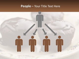 Three Chocolate Muffins On A Plate With Chocolate Drizzled On Them PowerPoint Template