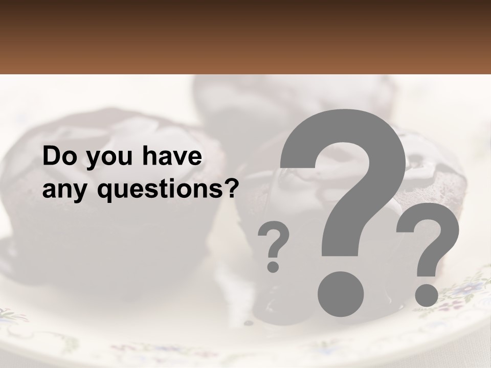 Three Chocolate Muffins On A Plate With Chocolate Drizzled On Them PowerPoint Template