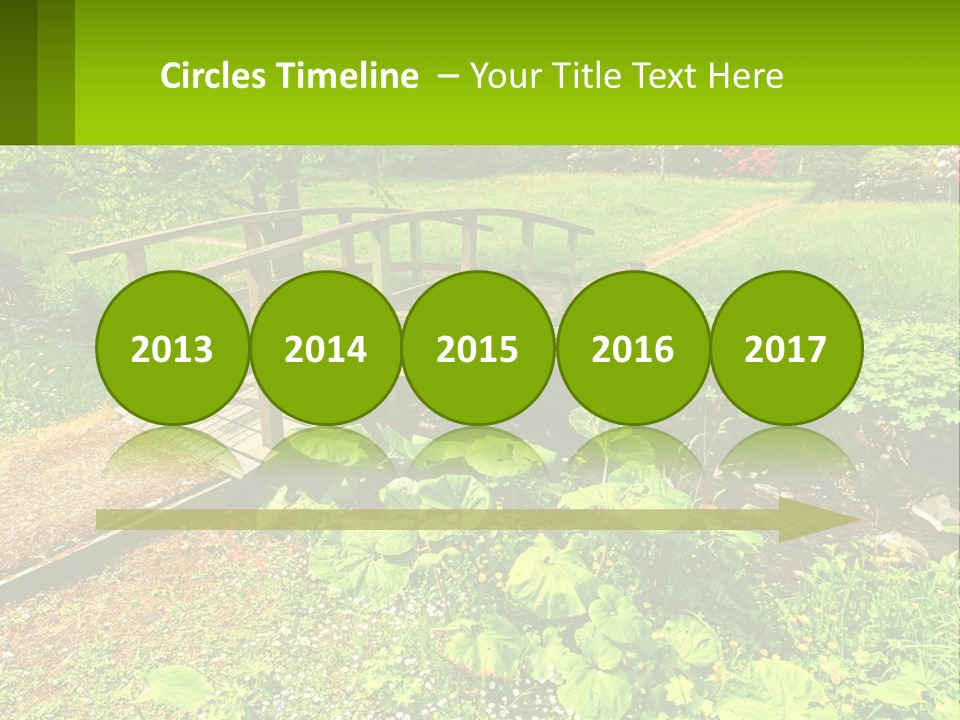 A Wooden Bridge Over A Small Stream In A Park PowerPoint Template