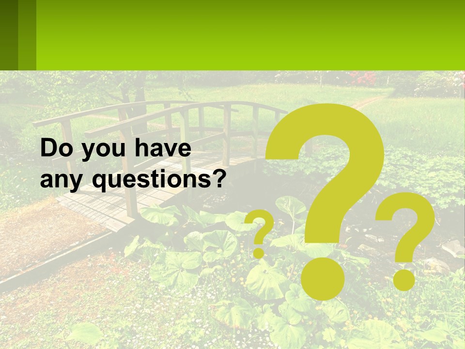 A Wooden Bridge Over A Small Stream In A Park PowerPoint Template