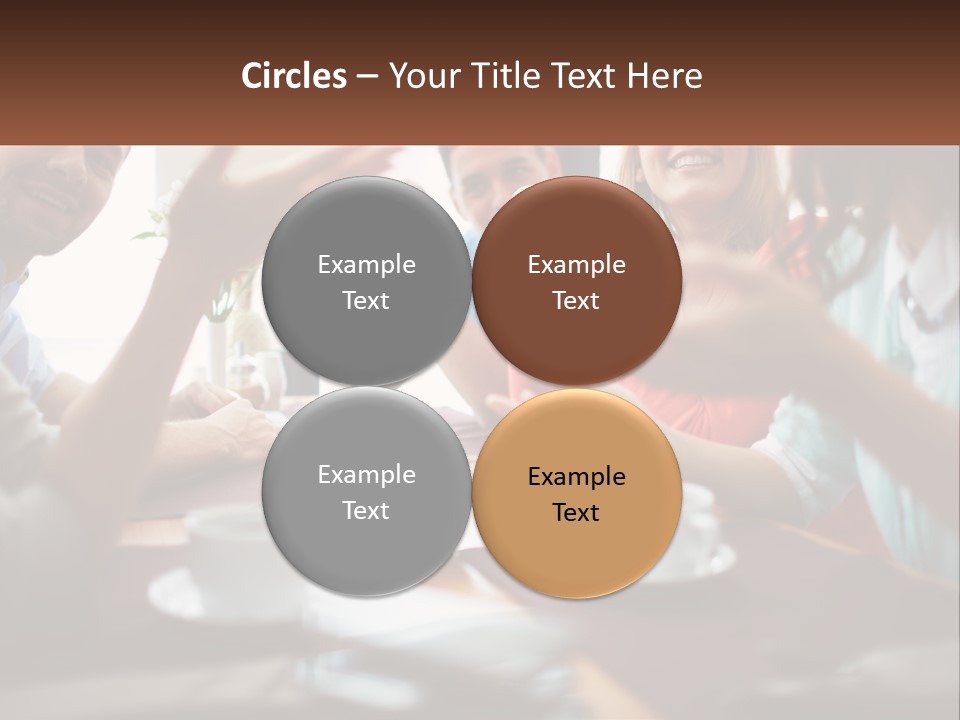 A Group Of People Sitting Around A Wooden Table PowerPoint Template