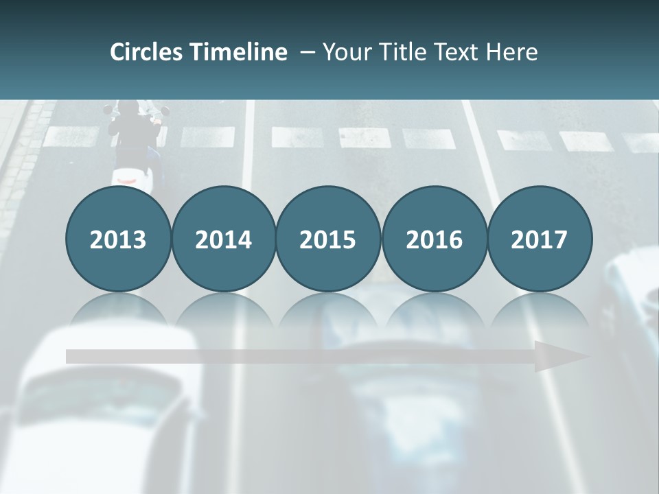 A Motorcyclist Riding Down The Road In Traffic PowerPoint Template