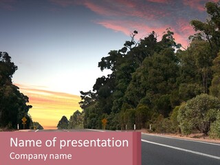 A Picture Of A Road With Trees And Sky In The Background PowerPoint Template