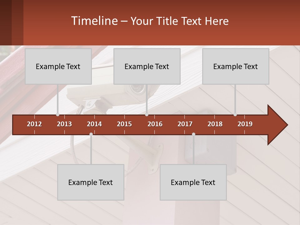 A Security Camera Attached To The Side Of A House PowerPoint Template