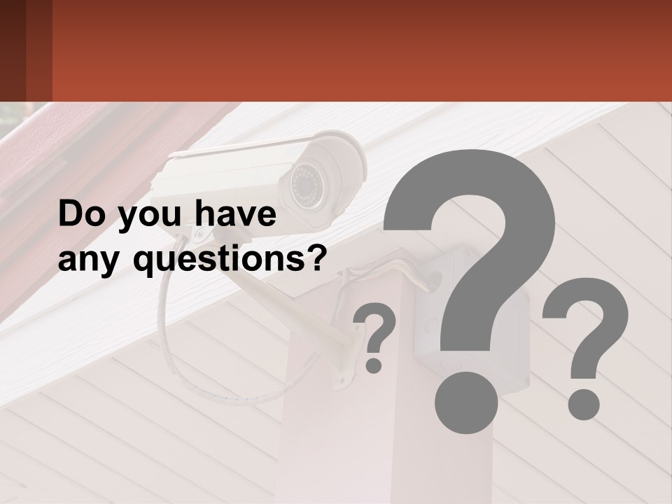 A Security Camera Attached To The Side Of A House PowerPoint Template