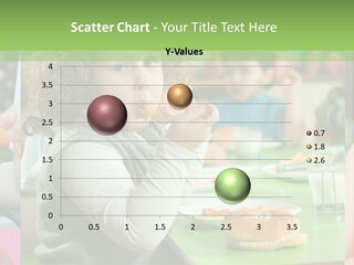 A Group Of Children Sitting At A Table Eating Food PowerPoint Template
